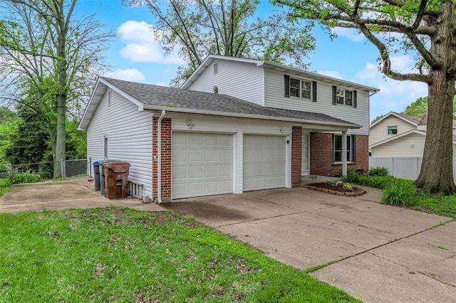 traditional home with brick siding, a garage, concrete driveway, and a shingled roof