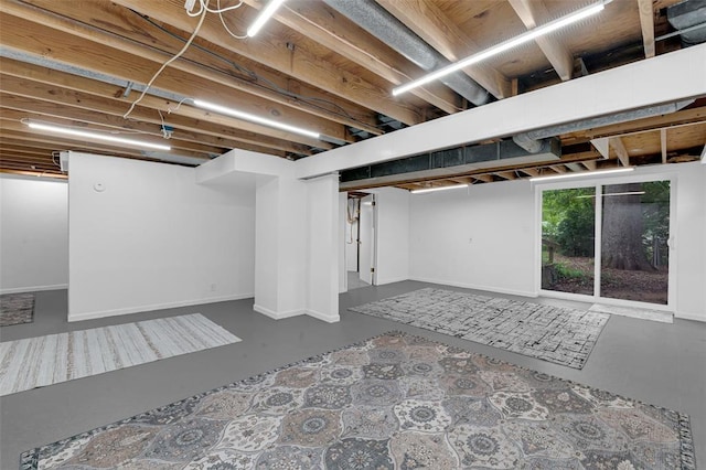 basement featuring baseboards