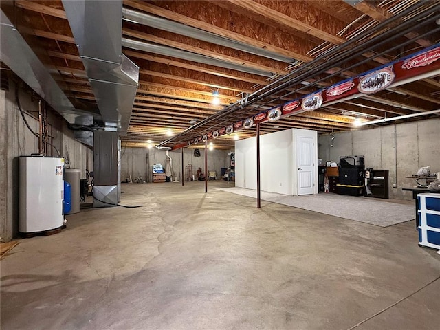 unfinished basement with water heater, heating unit, and gas water heater
