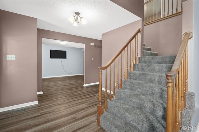 881 Sara Beth Ct, Saint Peters, MO 63376 - stairway with wood finished floors and baseboards