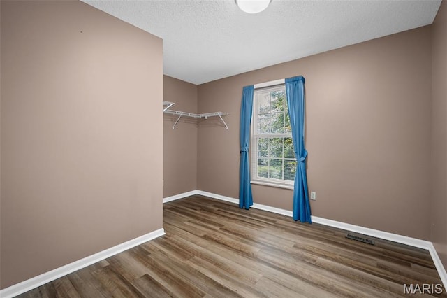 881 Sara Beth Ct, Saint Peters, MO 63376 - walk in closet featuring wood finished floors