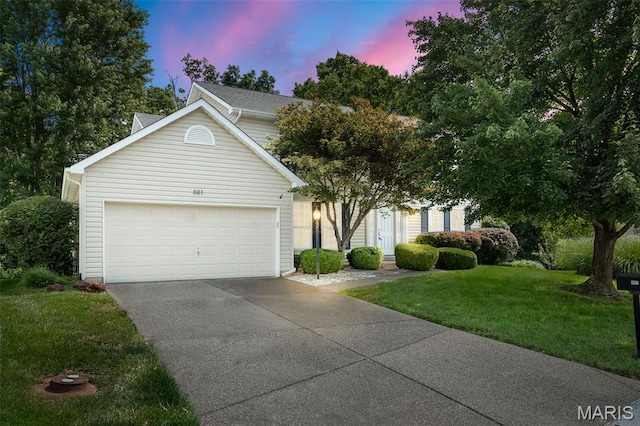 881 Sara Beth Ct, Saint Peters, MO 63376 - view of front of property with a yard, driveway, and a garage