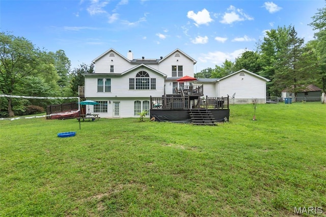 15092 State Highway Ad, Dexter, MO 63841 - rear view of house featuring a wooden deck and a chimney