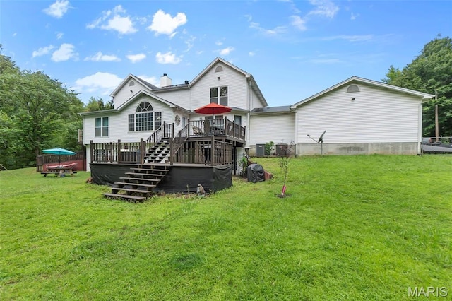 15092 State Highway Ad, Dexter, MO 63841 - rear view of house featuring a deck, a yard, a chimney, and stairway