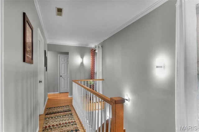 15092 State Highway Ad, Dexter, MO 63841 - corridor with an upstairs landing, light wood finished floors, and ornamental molding