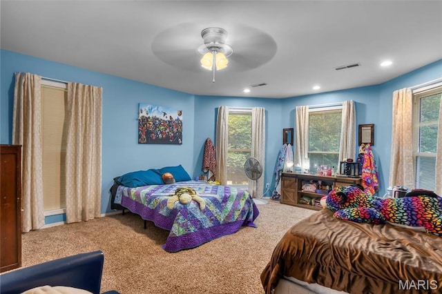 15092 State Highway Ad, Dexter, MO 63841 - carpeted bedroom featuring multiple windows, ceiling fan, and recessed lighting