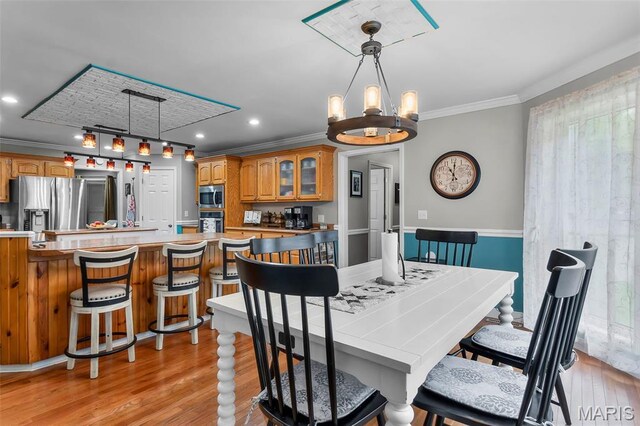 15092 State Highway Ad, Dexter, MO 63841 - dining room featuring ornamental molding, light wood-style flooring, a chandelier, and recessed lighting