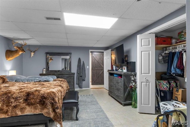 15092 State Highway Ad, Dexter, MO 63841 - bedroom featuring a paneled ceiling and a closet