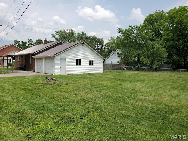 1225 Bloomfield Rd, Cape Girardeau, MO 63703 - view of yard with driveway and a garage
