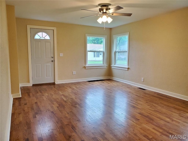 1225 Bloomfield Rd, Cape Girardeau, MO 63703 - entrance foyer featuring dark wood finished floors, a ceiling fan, and baseboards
