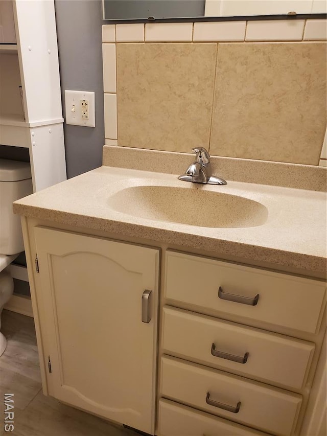 1225 Bloomfield Rd, Cape Girardeau, MO 63703 - half bathroom featuring vanity and toilet
