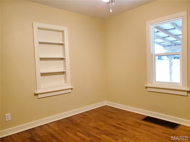 1225 Bloomfield Rd, Cape Girardeau, MO 63703 - empty room with baseboards and wood finished floors