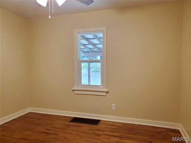 1225 Bloomfield Rd, Cape Girardeau, MO 63703 - empty room with baseboards, dark wood-type flooring, and ceiling fan