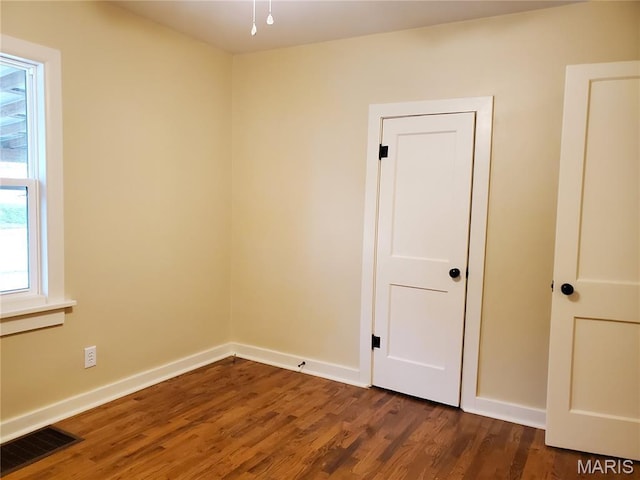 1225 Bloomfield Rd, Cape Girardeau, MO 63703 - unfurnished room featuring wood finished floors and baseboards