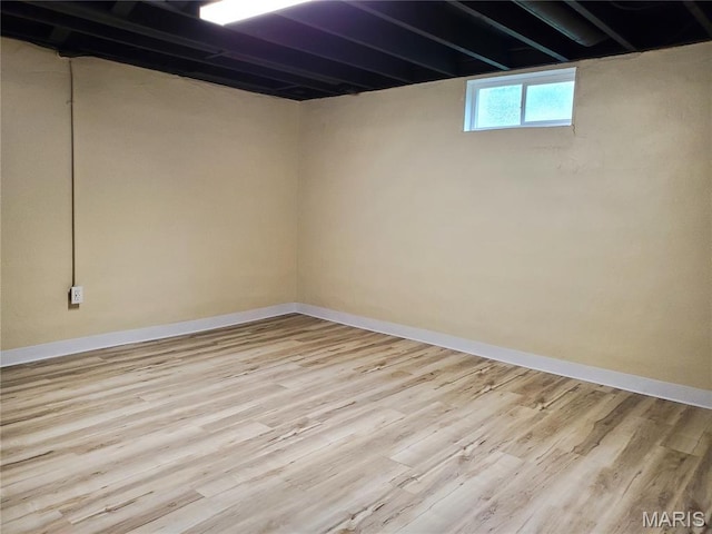 1225 Bloomfield Rd, Cape Girardeau, MO 63703 - below grade area featuring wood finished floors and baseboards