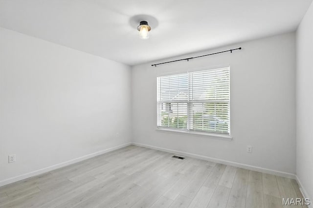 2112 Windswept Farms Dr, Eureka, MO 63025 - unfurnished room featuring light wood-type flooring and baseboards