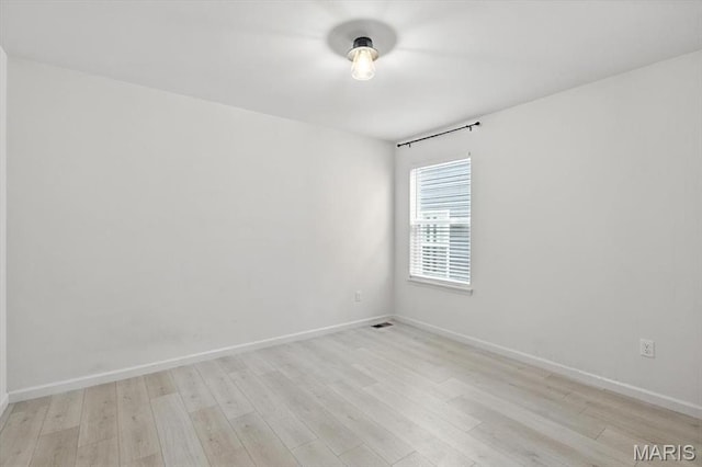 2112 Windswept Farms Dr, Eureka, MO 63025 - unfurnished room with light wood-type flooring and baseboards