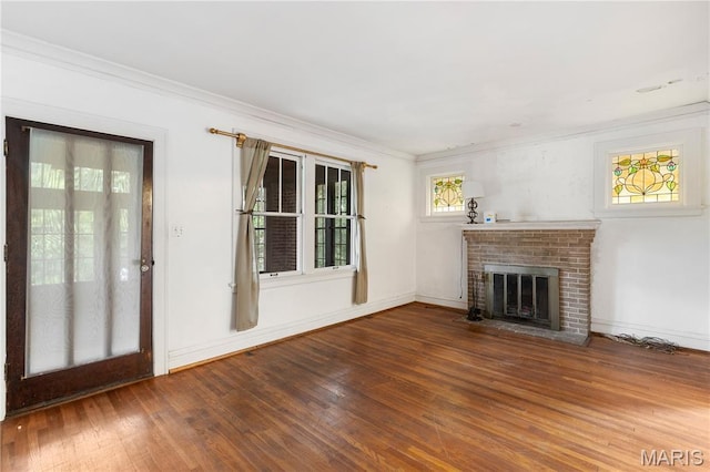 870 Tuxedo Blvd, Saint Louis, MO 63119 - unfurnished living room with wood finished floors, a brick fireplace, and ornamental molding