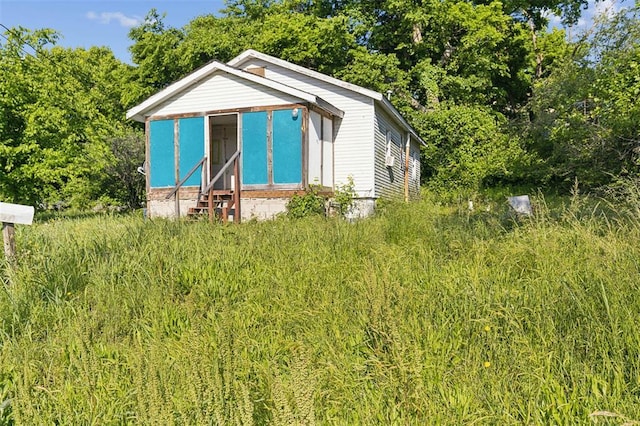 view of outbuilding featuring an outdoor structure