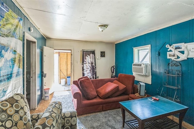 living room with cooling unit and crown molding