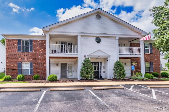 902 Hanna Place Ct Unit A, Manchester, MO 63021 - view of building exterior featuring uncovered parking