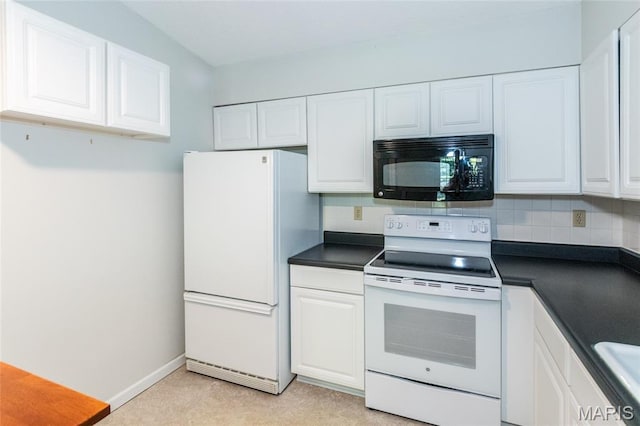 902 Hanna Place Ct Unit A, Manchester, MO 63021 - kitchen with white appliances, dark countertops, and tasteful backsplash