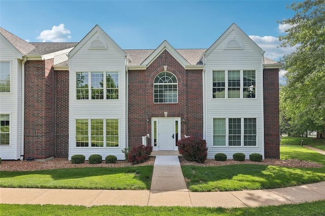 1625 Forest Springs Ln Unit A, Ballwin, MO 63021 - view of property featuring a front yard and brick siding