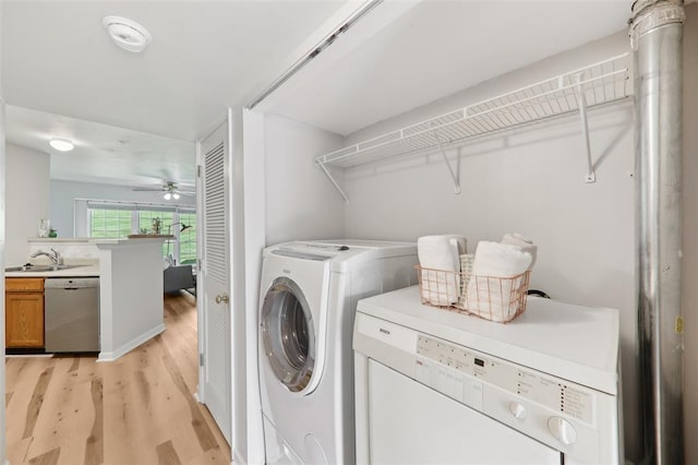 1625 Forest Springs Ln Unit A, Ballwin, MO 63021 - washroom with independent washer and dryer, light wood-style floors, a ceiling fan, and a sink