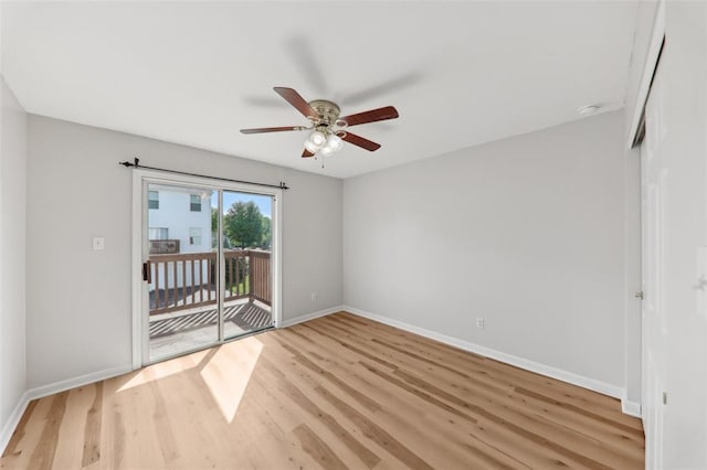 1625 Forest Springs Ln Unit A, Ballwin, MO 63021 - spare room featuring baseboards, light wood-style flooring, and ceiling fan
