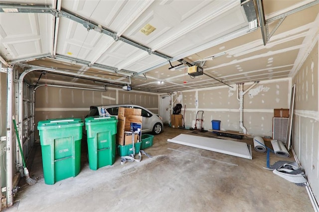 1625 Forest Springs Ln Unit A, Ballwin, MO 63021 - garage featuring a garage door opener