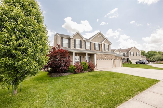 view of front of house with a garage, a front lawn, concrete driveway, and brick siding