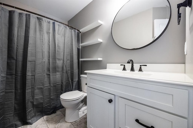 full bathroom featuring toilet, vanity, and a shower with shower curtain