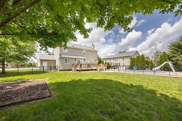 view of yard with a deck