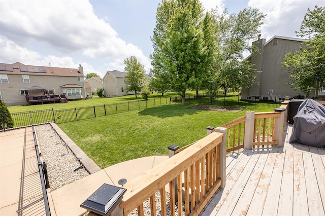 wooden terrace with a residential view
