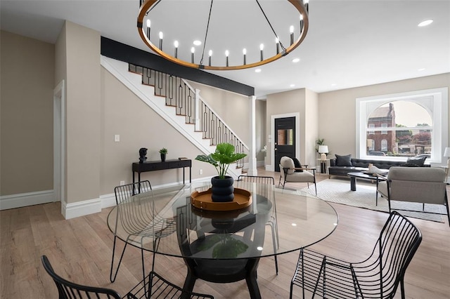 3235 S Jefferson Ave, Saint Louis, MO 63118 - dining space featuring light wood-style flooring, stairway, baseboards, and recessed lighting