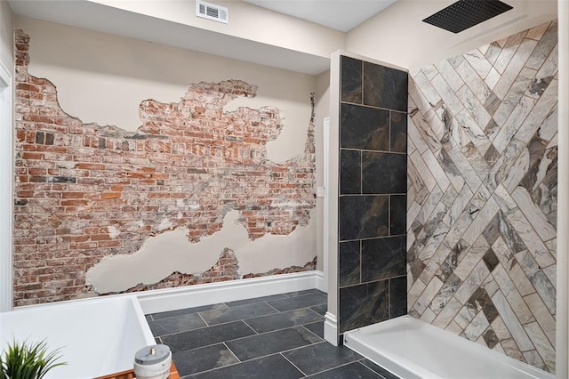 3235 S Jefferson Ave, Saint Louis, MO 63118 - full bath with tiled shower, tile patterned flooring, and baseboards