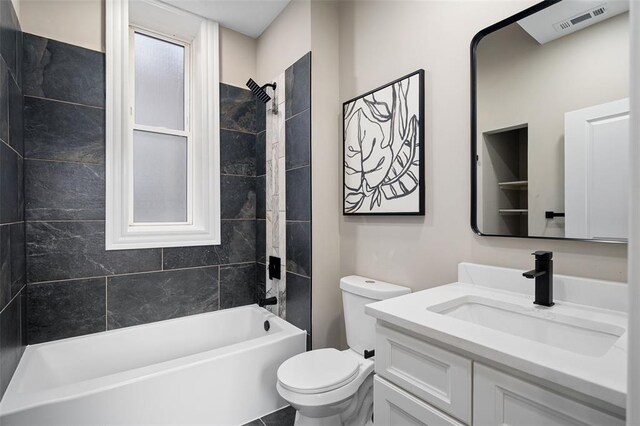 3235 S Jefferson Ave, Saint Louis, MO 63118 - bathroom with toilet, shower / bath combination, and vanity