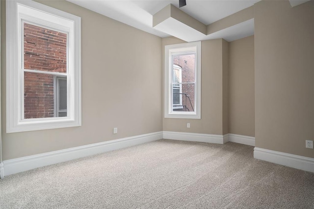 3235 S Jefferson Ave, Saint Louis, MO 63118 - spare room with carpet flooring and baseboards