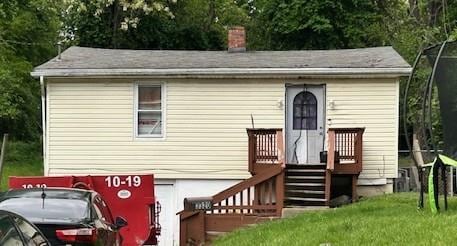 3320 Franor St, Alton, IL 62002 - view of front of home with a chimney, a front lawn, and view of scattered trees