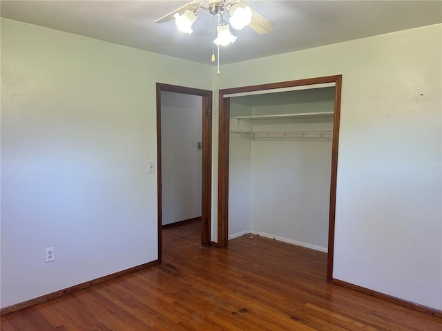 12219 Peter Moore Ln, De Soto, MO 63020 - unfurnished bedroom with a closet, wood finished floors, baseboards, and a ceiling fan