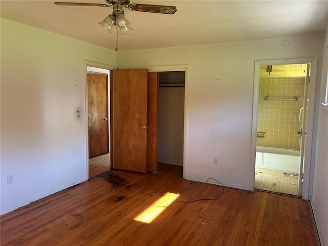 12219 Peter Moore Ln, De Soto, MO 63020 - unfurnished bedroom with wood finished floors, a closet, and ensuite bath
