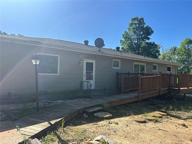 12219 Peter Moore Ln, De Soto, MO 63020 - back of house with a deck