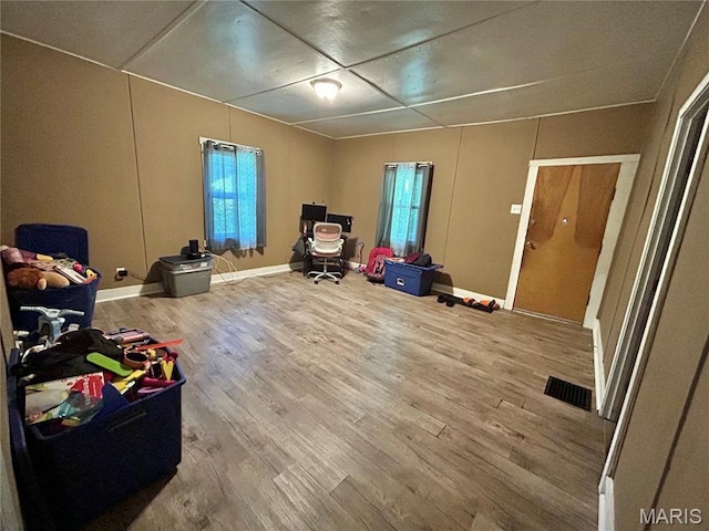 1305 Clawson St, Alton, IL 62002 - recreation room with wood finished floors and baseboards