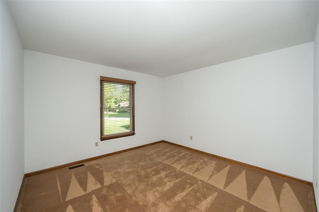 14 Wimbly Pl, Saint Charles, MO 63301 - spare room featuring baseboards and carpet