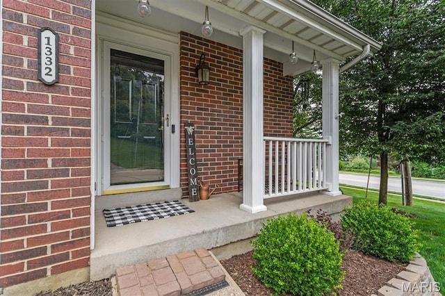 1332 Big Bend Crossing Dr, Manchester, MO 63088 - property entrance with covered porch and brick siding