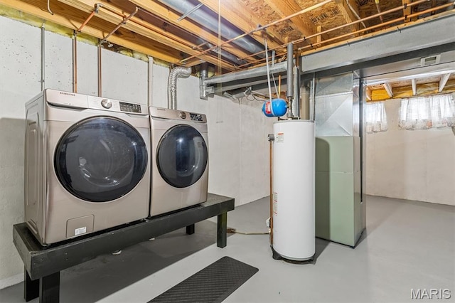 1332 Big Bend Crossing Dr, Manchester, MO 63088 - laundry area with gas water heater and washer and dryer