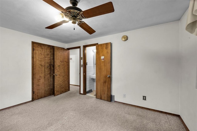 626 Sue Dr, Jackson, MO 63755 - unfurnished bedroom with carpet floors, baseboards, and ceiling fan