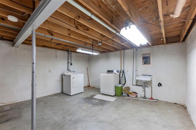 626 Sue Dr, Jackson, MO 63755 - unfinished basement featuring washing machine and dryer and a sink