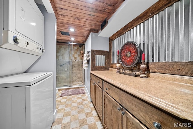 425 Cedar Ln, Wentzville, MO 63385 - laundry area with stacked washer / drying machine, wooden ceiling, and recessed lighting