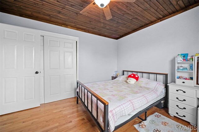 425 Cedar Ln, Wentzville, MO 63385 - bedroom with wood ceiling, light wood finished floors, a ceiling fan, and a closet